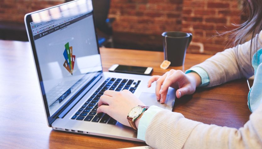 Student, typing, keyboard — AI in Education: Empowering Learning Through Smart Technologies