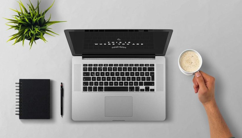 Laptop, coffee, arm — Part-Time Work for Her: Seeking Talented Women